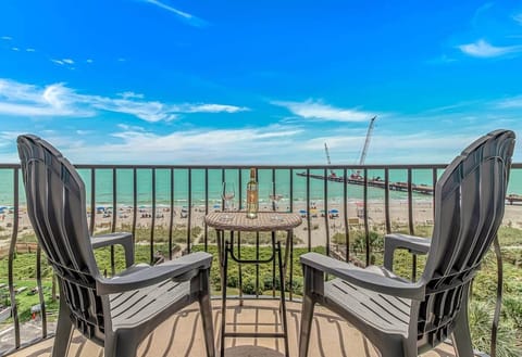 Enjoy morning coffee or a glass of wine with the sound of waves just steps away! 