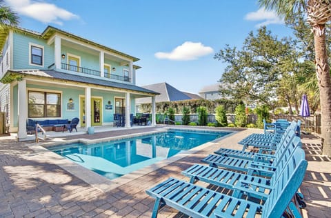 Sand Pebble—your perfect group getaway that SLEEPS 20! Just steps from beach access, this stunning retreat includes a FREE golf cart. Unwind in the backyard oasis with a heated poo, outdoor kitchen, and lounge seating!
