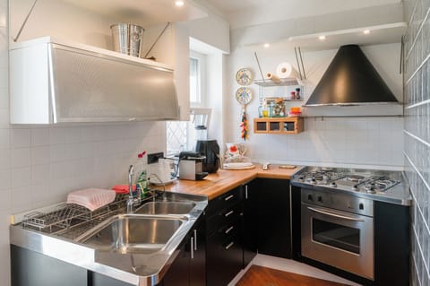 Deluxe Apartment, City View | Private kitchen | Full-size fridge, oven, stovetop, espresso maker