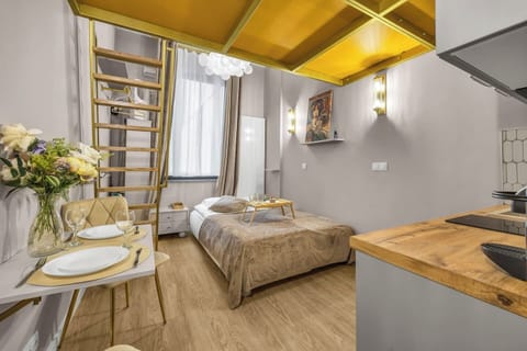 Cozy Studio with Sofa Bed and Mezzanine Bedroom | Book Now with RENTUJEMY