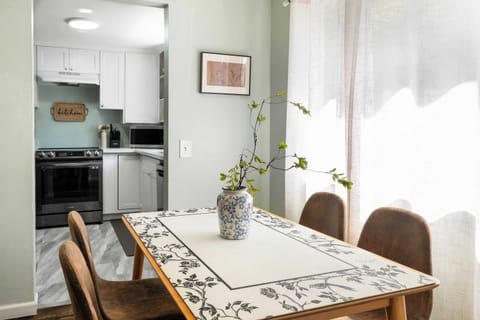 Here is the dinning table next to a bright window