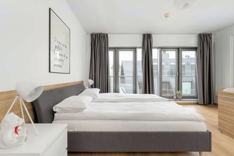 Enjoy your favorite shows on the flat-screen television in the elegant living area.