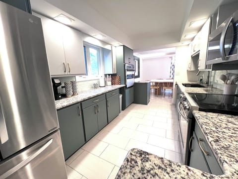 Kitchen fully equipped with pots and pans, silverware, etc