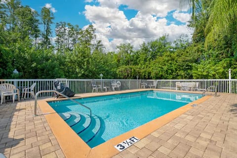 Dive into sparkling sunshine and unwind poolside in peace.