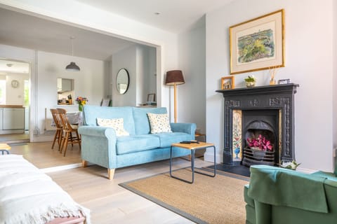 Ground floor: Sitting room with dining table and on to kitchen