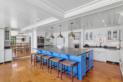 Spacious kitchen has an expansive island and creates a social food prep experience