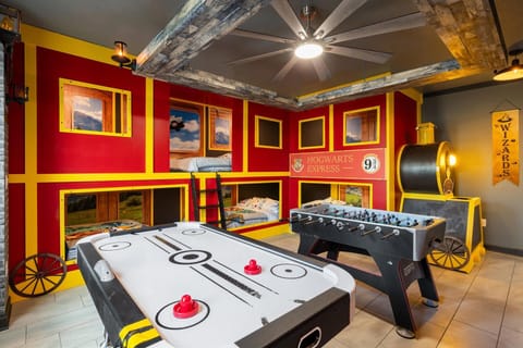 Game Room / Bedroom 8 
Three Double/Double Bunks
65" Roku TV
Two 32" Roku TVs with Game Consoles
Foosball  Air Hockey