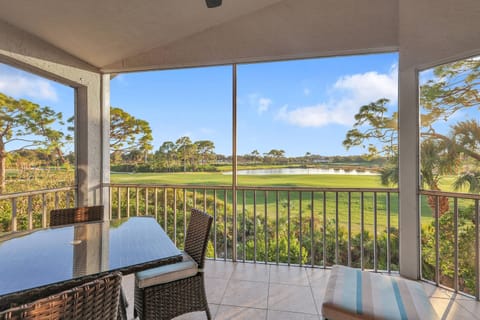 The quintessential Old-Florida view is your to enjoy - palm trees, lives oaks, and a lake that may have a native visitor or two from time to time!