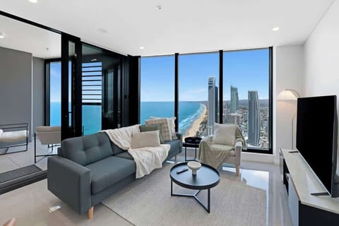Endless ocean + skyline views from your living room enjoy watching your favourite movies on a 65 inch TV