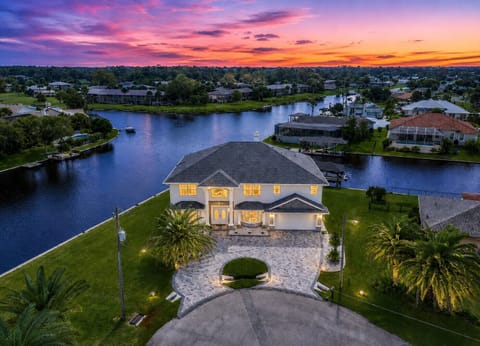 Welcome to Serene Luxury Waters canal and pool home!