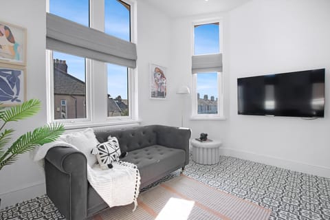 Apartment (The Family Nest – 3-Bed Apartment w) | Living room | Flat-screen TV