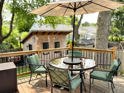 Back porch off of main living space, in private fenced in backyard