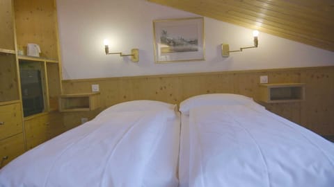 Family Quadruple Room | Blackout drapes, rollaway beds, free WiFi, bed sheets