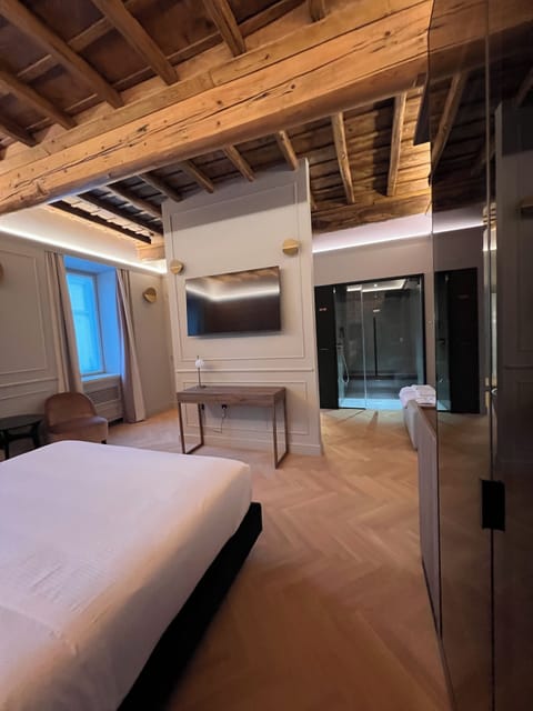 Junior Suite, 1 Queen Bed, Sauna | Hypo-allergenic bedding, minibar, in-room safe, blackout drapes