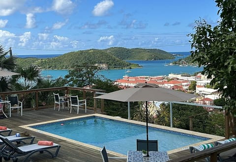 Outdoor pool, pool umbrellas, sun loungers