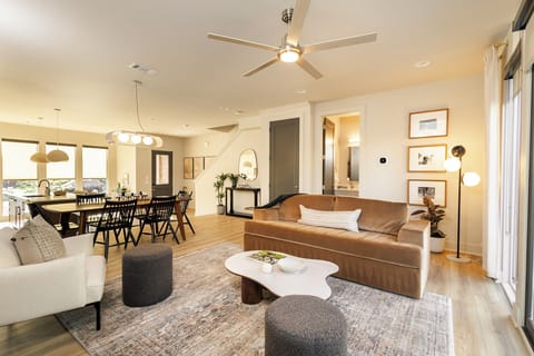 Spacious open concept kitchen, dining, and living area designed for comfort and seamless flow. With queen sized pull out