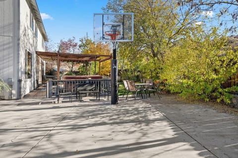 Ambiance highlights this home’s modern charm and private court.