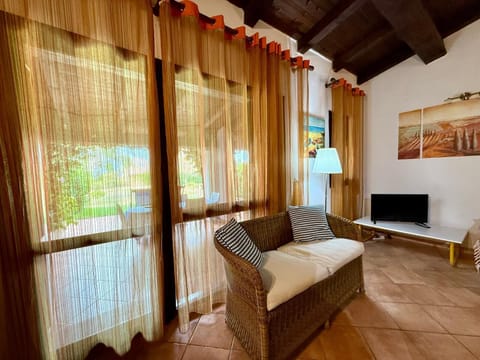 Apartment | Living area | 22-inch flat-screen TV with cable channels