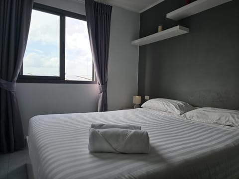 Apartment, Balcony | In-room safe, blackout drapes, iron/ironing board, free WiFi