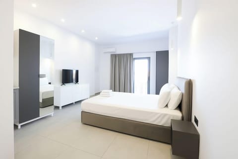 Standard Quadruple Room, Balcony, Sea View | Minibar, blackout drapes, soundproofing, iron/ironing board