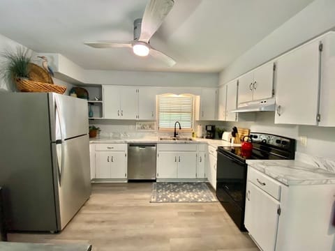 Spacious, well-equipped kitchen with all you need to prepare meals or snacks during your stay.  