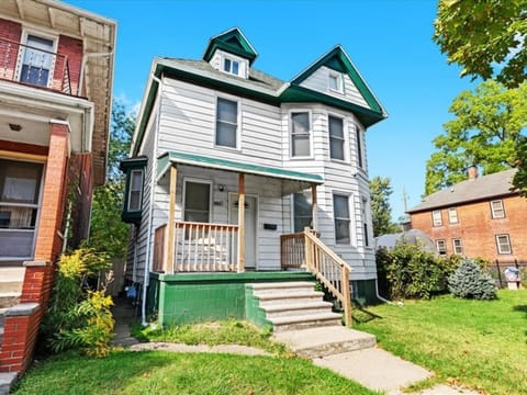 Charming 4 BR family home with front porch and yard