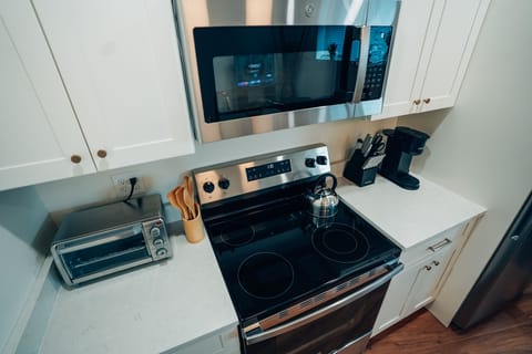 Toaster oven, Keurig 12 cup coffee maker, teapot, microwave