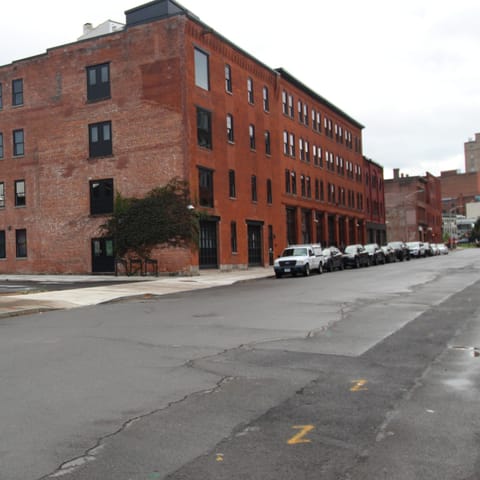 Other buildings and businesses on Hotel Street.  Free daytime street parking.