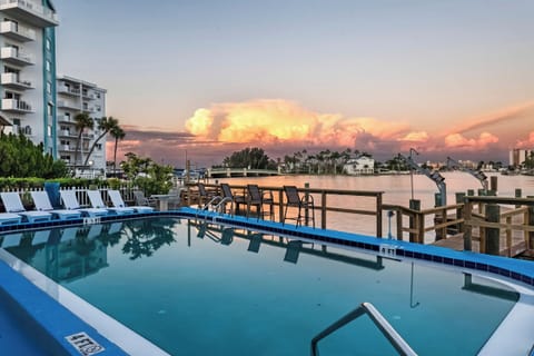 Evening swims with skies that glow—your poolside paradise.