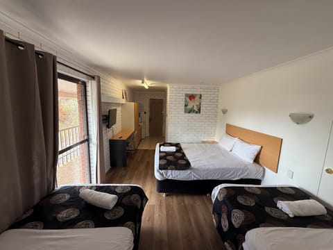 Quadruple Room, Balcony | Desk, iron/ironing board (on request), WiFi (free)