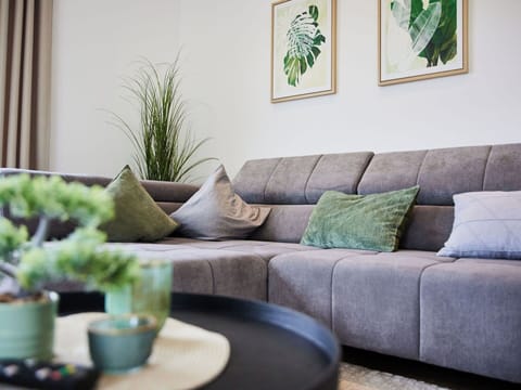 Flooring, Interior Design, Floor, Furniture, Wood Flooring, Living Room, Home, Laminate Flooring, Room, Houseplant