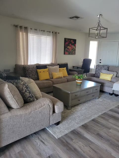 The living room, welcomes you to the house .