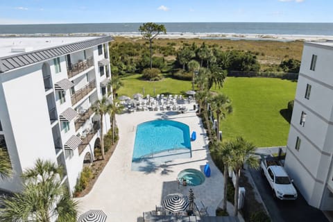 Enjoy the community pool and hot tub just a short stroll from the beach.
