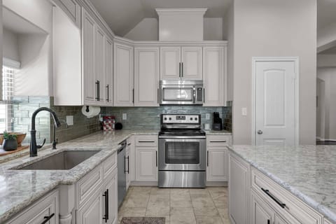 Toaster, nutribullet, hand mixer, & pots and pans provided