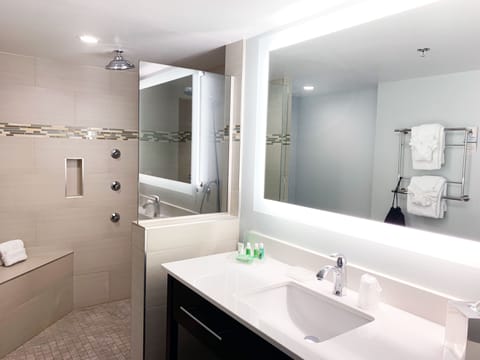 Premium bedding, desk, laptop workspace, iron/ironing board