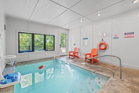 Indoor pool with playful touches and relaxing seating.