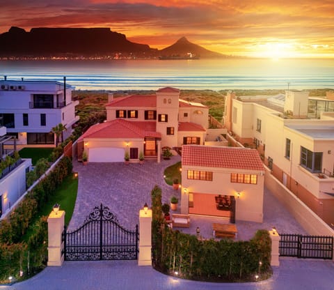 Golden sunsets over this luxurious beachfront Villa. 