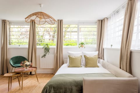 Apartment, Garden View | Living area | 32-inch Smart TV with cable channels, Netflix, streaming services