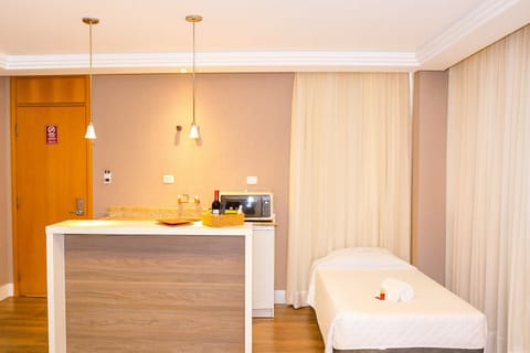 Sip wine and enjoy quick snacks at your in-room counter.