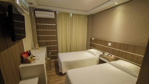 Settle in after adventures with cozy beds and in-room TV.