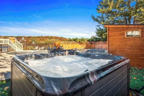 Soak in the hot tub after a day of hiking, skiing, or exploring the Poconos.