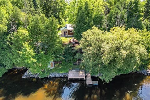 Exclusive dock overlooking the Ottawa River, offering direct water access and stunning views.
