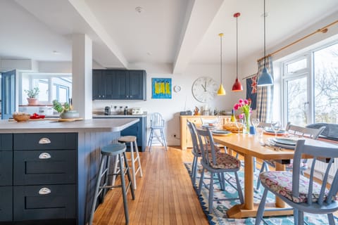 Ground floor: Breakfast bar with seating for two with dining table for six guests