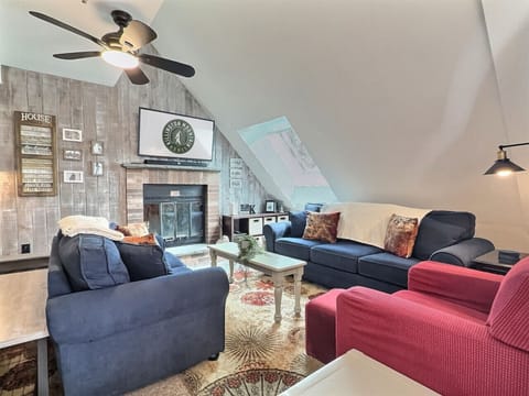 Living room with fireplace and seating area