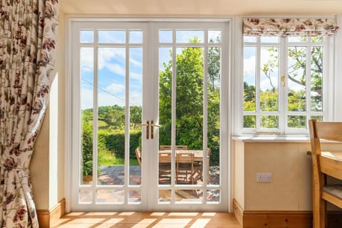 French doors leading to terrace and garden
