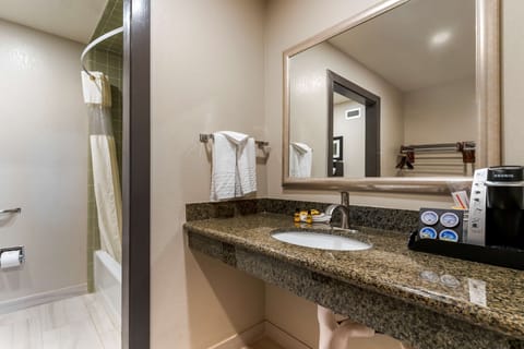 Hypo-allergenic bedding, in-room safe, laptop workspace