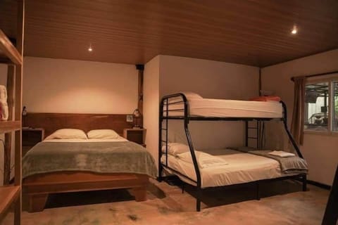 Queen bed and bunk bed