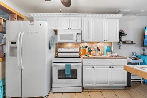 Prepare your favorite meals in the spacious, fully equipped kitchen. 