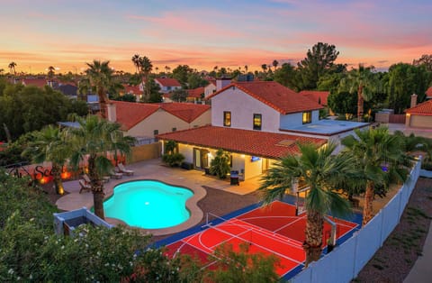 Backyard with pool and Sports Court for Pickleball, Basketball, and fun.