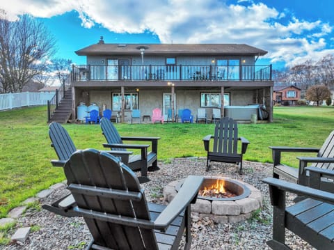 Lakefront Fire Pit with Adirondack Chairs and Scenic Views